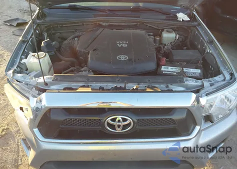 2014 Toyota Tacoma Base V6 z USA, uszkodzony, nr VIN 3TMLU4EN1EM144853
